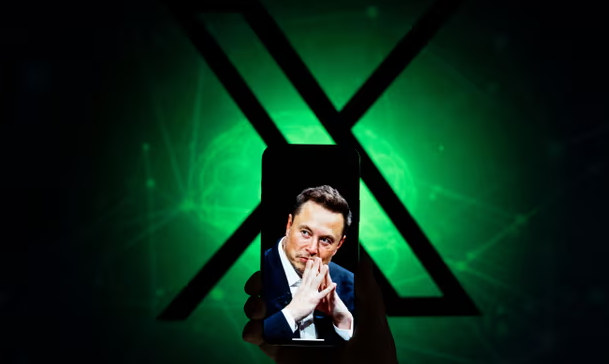 Elon Musk on the screen of a mobile device with the X logo in the background in this illustration photo on 23 August 2023. Photograph: Jaap Arriens/NurPhoto/Shutterstock