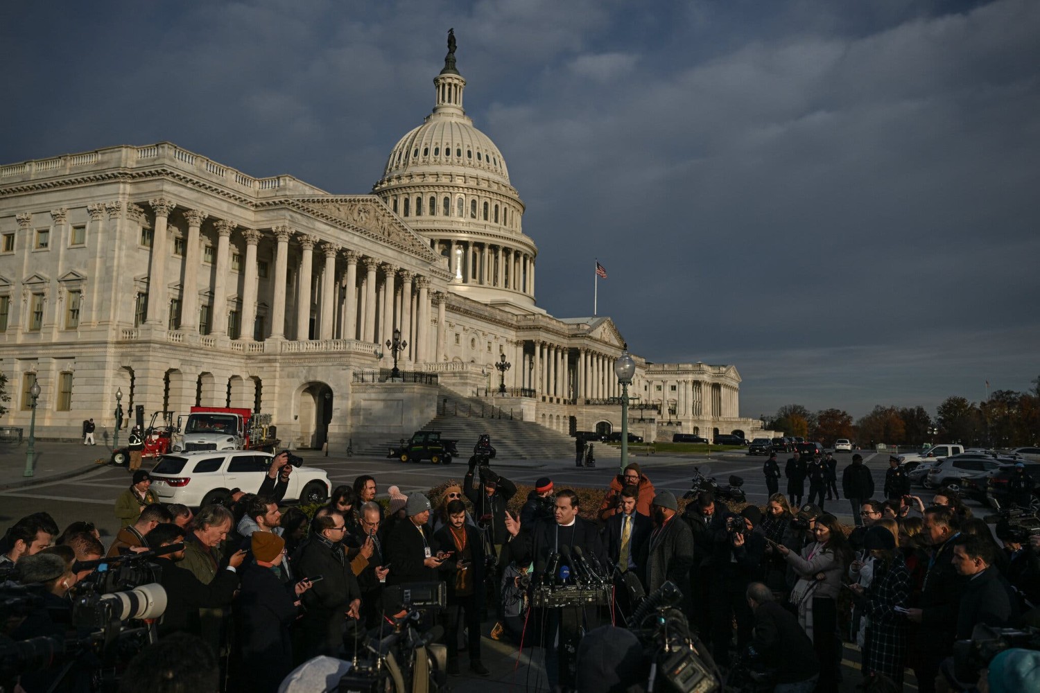 George Santos argued against his expulsion at an early-morning news conference outside the U.S. Capitol on Thursday.Credit...Kenny Holston/The New York Times