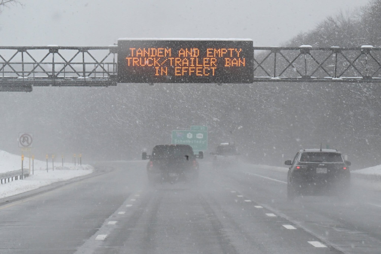 Drivers in Albany on Saturday. Forecasters warned of dangerous travel conditions as the Northeast was getting heavy snowfall, freezing rain or a mix of the two.Credit...Hans Pennink/Associated Press