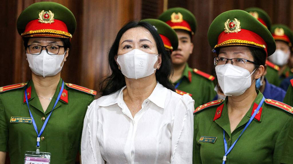 Vietnam's property tycoon Truong My Lan arrives at a court in Ho Chi Minh City. Picture: AFP