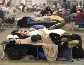 An evacuees from the Thomas Fire rests in the Ventura County Fairgrounds evacuation center in Ventura, Calif.