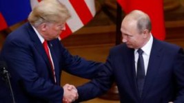 REUTERS /Mr Trump (left) with Mr Putin in Helsinki in July 2