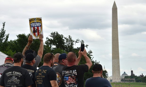 Supporters listen to Trump speak, by the Washington Monument. Photograph: Mladen Antonov/AFP/Getty Images