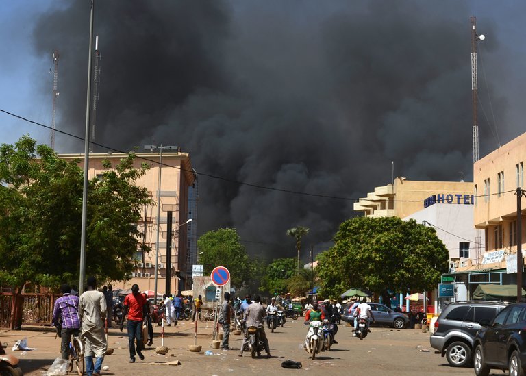Assaults on Friday in Ouagadougou, the capital of Burkina Faso, left at least 6 attackers dead. Credit Ahmed Ouoba/Agence France-Presse — Getty Images