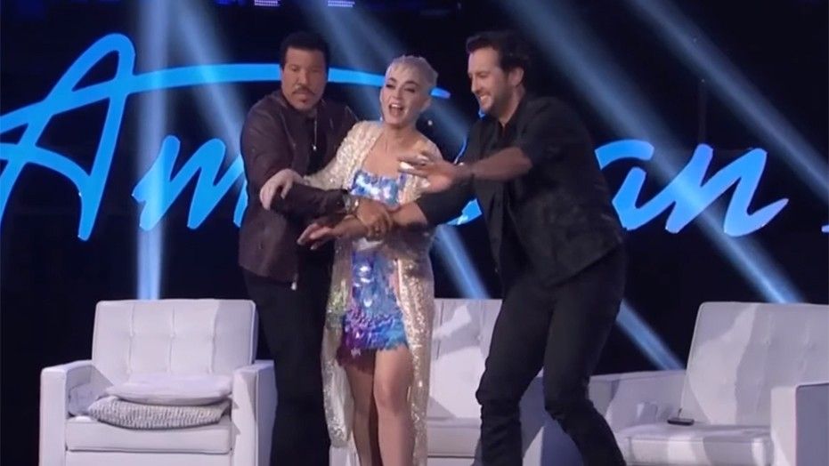 Lionel Richie and Luke Bryan held Katy Perry back from ambushing a male "American Idol" contestant.