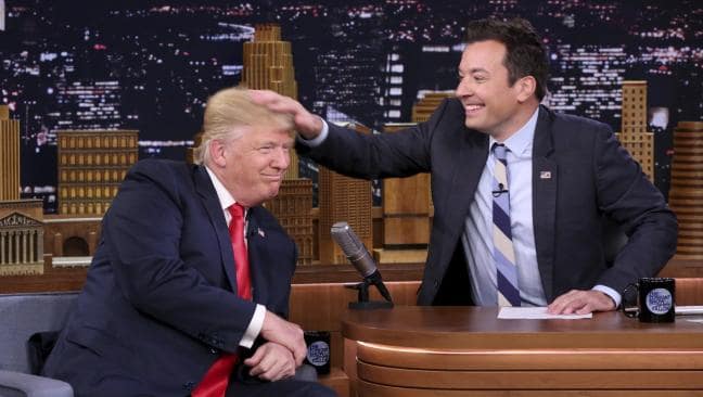 Jimmy Fallon says he regrets tousling Donald Trump’s hair during the presidential campaign.Source:AP