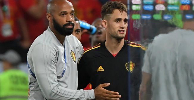 © Patrick Hertzog, AFP | Belgium's assistant coach Thierry Henry congratulates Belgium's forward Adnan Januzaj at the end of the Russia 2018 World Cup Group G football match between England and Belgium in Kaliningrad on June 28, 2018.