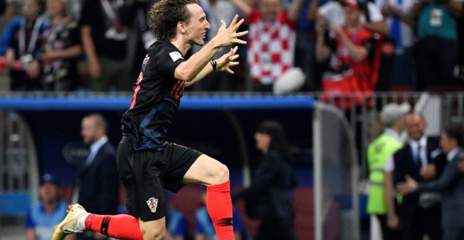 © Alexander Nemenov, AFP | Croatia's midfielder Luka Modric celebrates his team's victory at the end of the Russia 2018 World Cup semi-final football match between Croatia and England at the Luzhniki Stadium in Moscow on July 11, 2018.