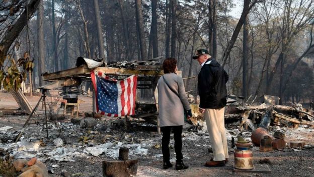 AFP I/Mr Trump viewed the damage to homes in the town of Paradise, which was ravaged by fire
