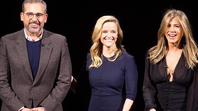 Star power: Steve Carell, Reese Witherspoon and Jennifer Aniston speak during an event launching Apple TV+. Picture: NOAH BERGER / AFP)Source:AFP