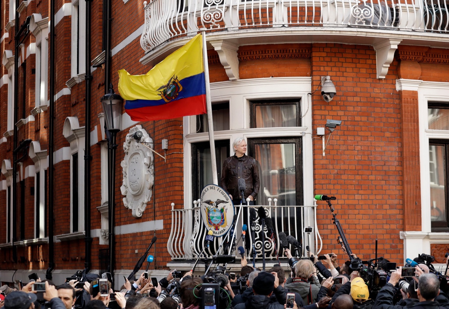 The WikiLeaks founder Julian Assange in 2017 on the balcony of the Ecuadorean Embassy in London. The Ecuadorean government said this March that it had cut off his internet access.CreditCreditMatt Dunham/Associated Press