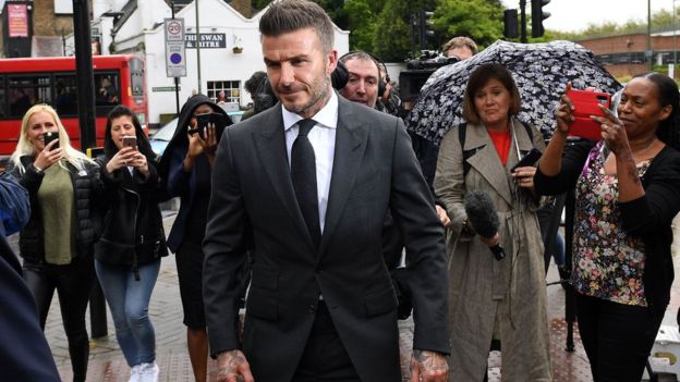AFP/GETTY IMAGES / The court heard Beckham was photographed driving in "slowly moving" traffic while holding a phone