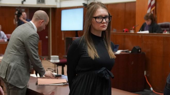 TIMOTHY A. CLARY/GETTY / Fake German heiress Anna Sorokin is led away after being sentenced