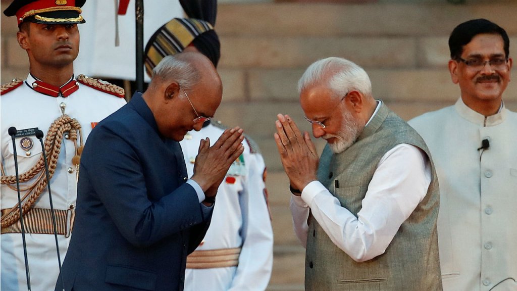 Adnan Abidi, Reuters | India's President Ram Nath Kovind greets India's PM Narendra Modi during his swearing-in ceremony in New Delhi, May 30, 2019.