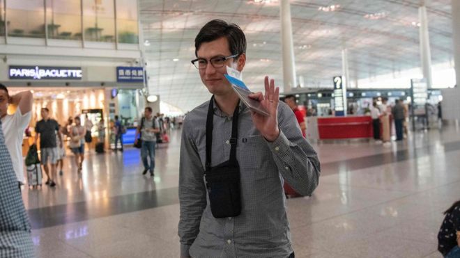AFP/GETTY IMAGES / Alex Sigley in transit in Beijing after his release from North Korea this week