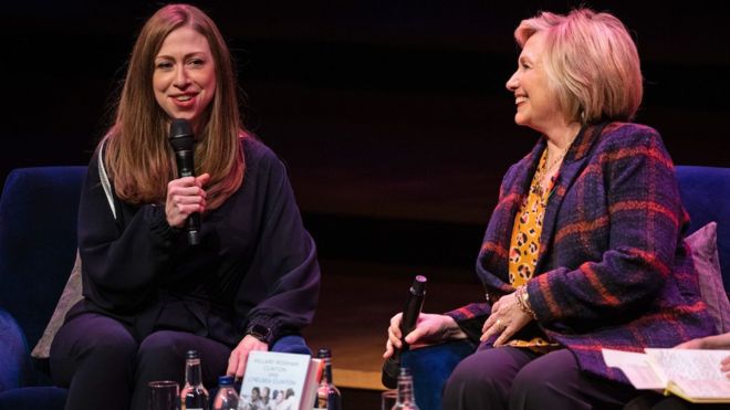 PA MEDIA / Hillary Clinton is promoting a book she co-wrote with her daughter, Chelsea Clinton (left)