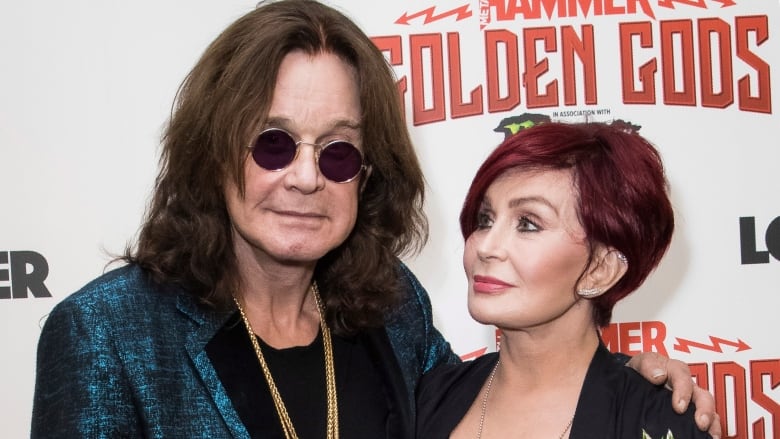 Ozzy Osbourne and his wife Sharon are seen in London attending the Metal Hammer Golden God awards in June 2018. The 71-year-old Grammy winner and former Black Sabbath singer has revealed he's been diagnosed with Parkinson's disease. (Vianney