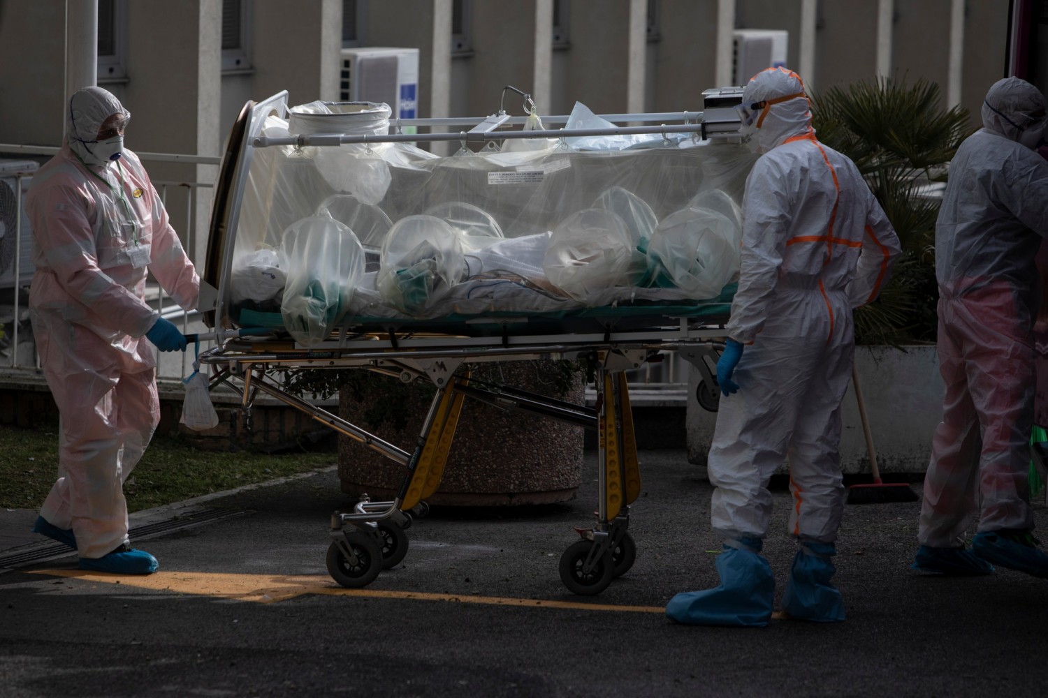 Unloading Covid-19 patients at a hospital in Rome. Experts worry that Italy’s confirmed caseload could double by the end of the month.Credit...Nadia Shira Cohen for The New York Times