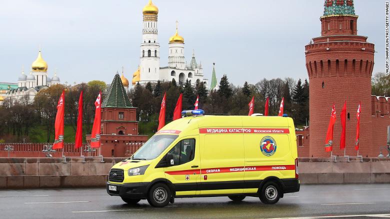An ambulance seen on Bolshoi Moskvoretsky Bridge during the ongoing COVID-19 coronavirus pandemic on May 4. Valery Sharifulin/TASS/Getty Images