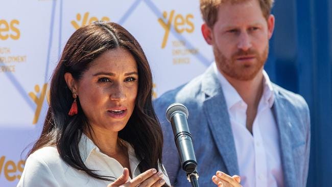 Meghan Markle is watched by Prince Harry as she speaks at the Youth Employment Services Hub in Tembisa township, Johannesburg. Picture: Michele Spatari / AFPSource:AFP