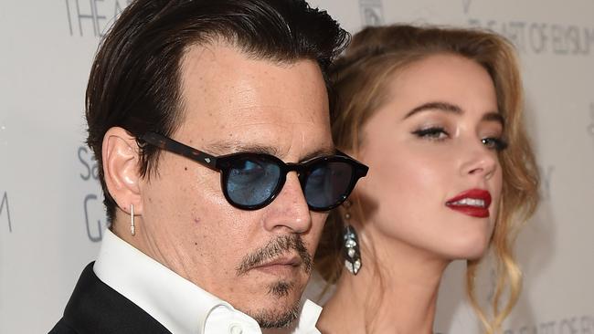 Johnny Depp and Amber Heard. Picture: Jason Merritt/Getty Images for Art of Elysium.Source:Supplied