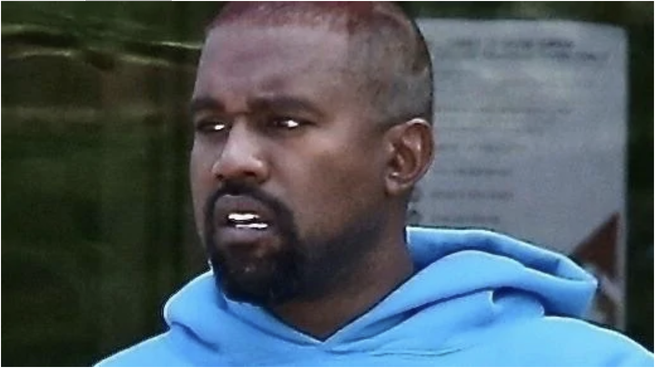 Kanye West, wearing a blue hoodie and with newly-dyed red hair, is spotted shopping at the Walmart in Cody, Wyoming. Picture: Backgrid.Source:BackGrid