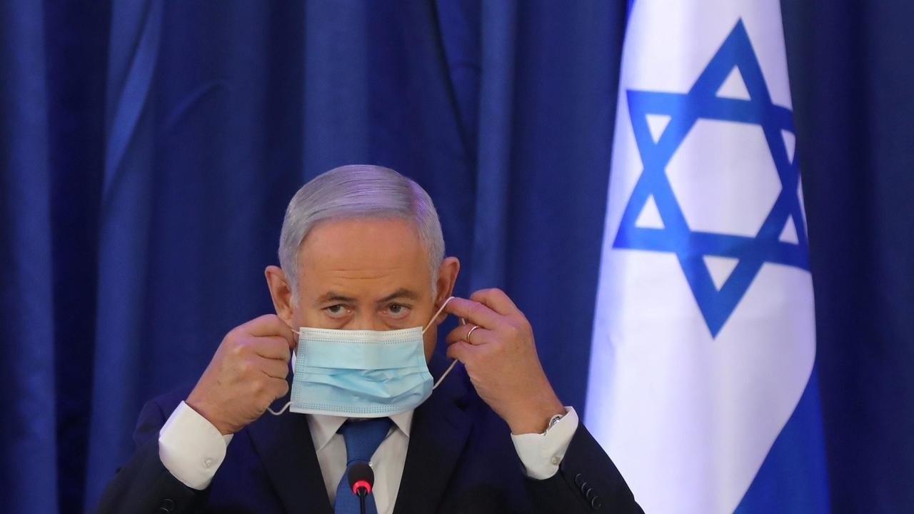 Israeli Prime Minister Benjamin Netanyahu's corruption trial will resume in earnest in January, with thrice-weekly evidentiary hearings set to begin then, a Jerusalem court decided July 19, 2020. © Abir Sultan, REUTERS