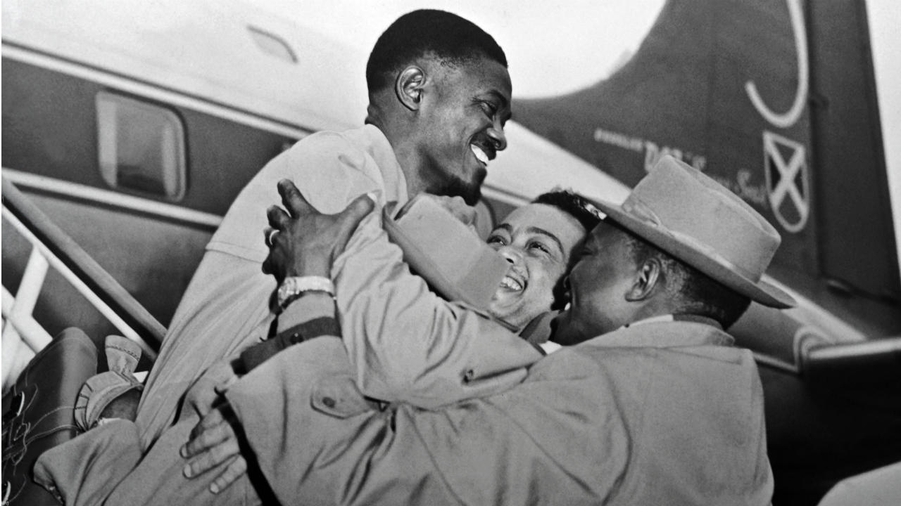 Leader of the Congolese national movement Patrice Lumumba is welcomed at Brussels airport on January 27, 1960, before attending a conference. Former Belgium Congo (now DR Congo) became independent on June 30, 1960. © AFP