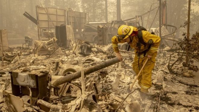 EPA / Wildfires swept through the town of Berry Creek in California