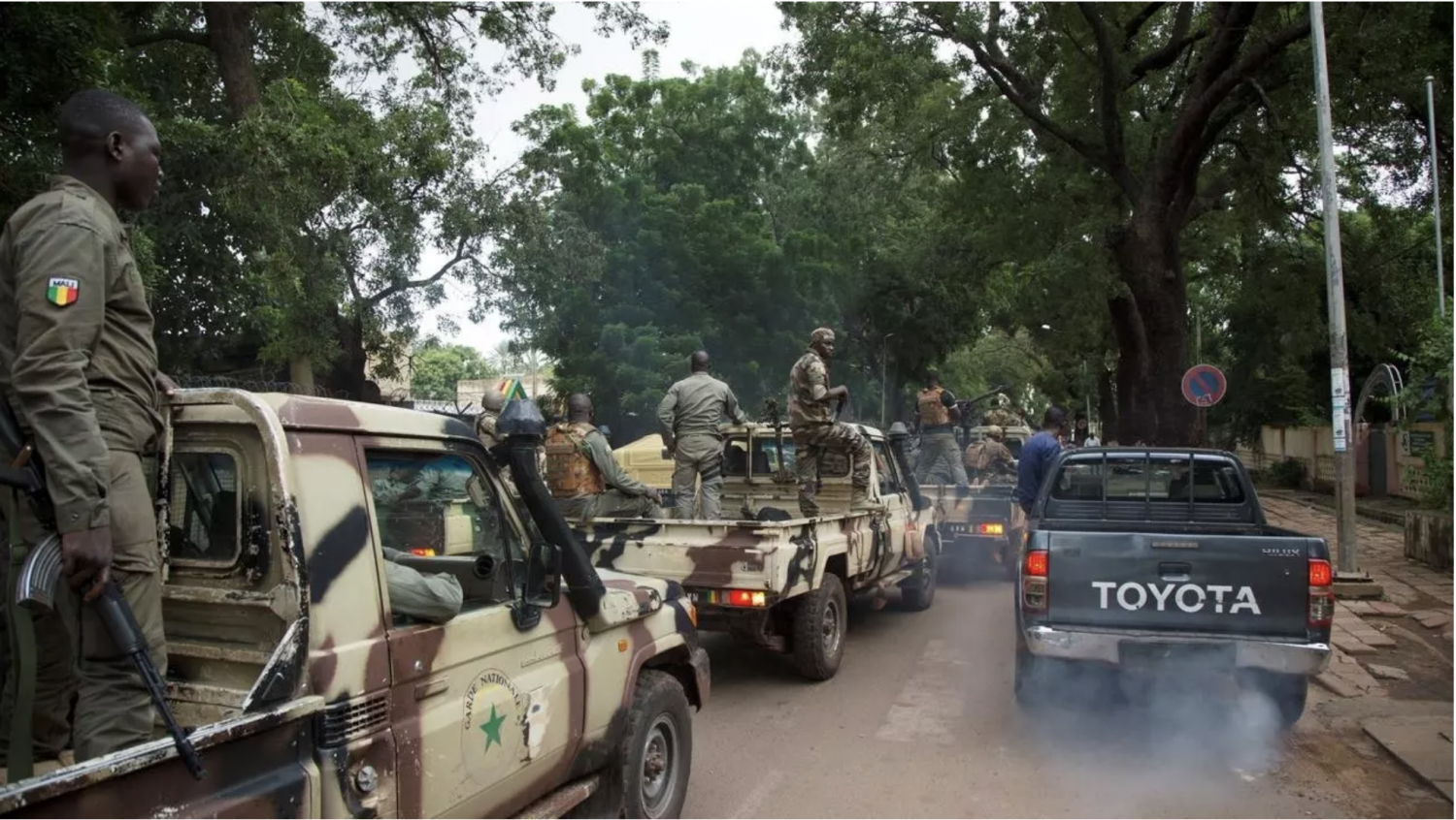 File photo of Malian military junta members arriving at the Defence Ministry in Bamako a day after the August 18, 2020 coup. AFP - ANNIE RISEMBERG