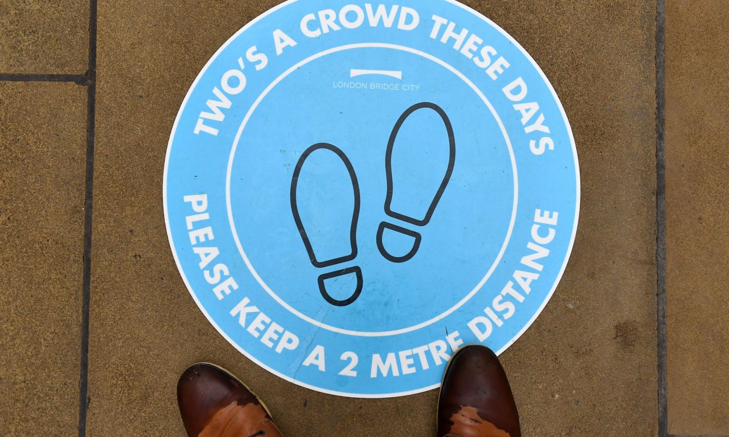 Covid signage in London. All adults in affected postcodes will be urged to get a PCR swab test and public health officials will start going door-to-door this week. Photograph: Anthony Harvey/Rex/Shutterstock