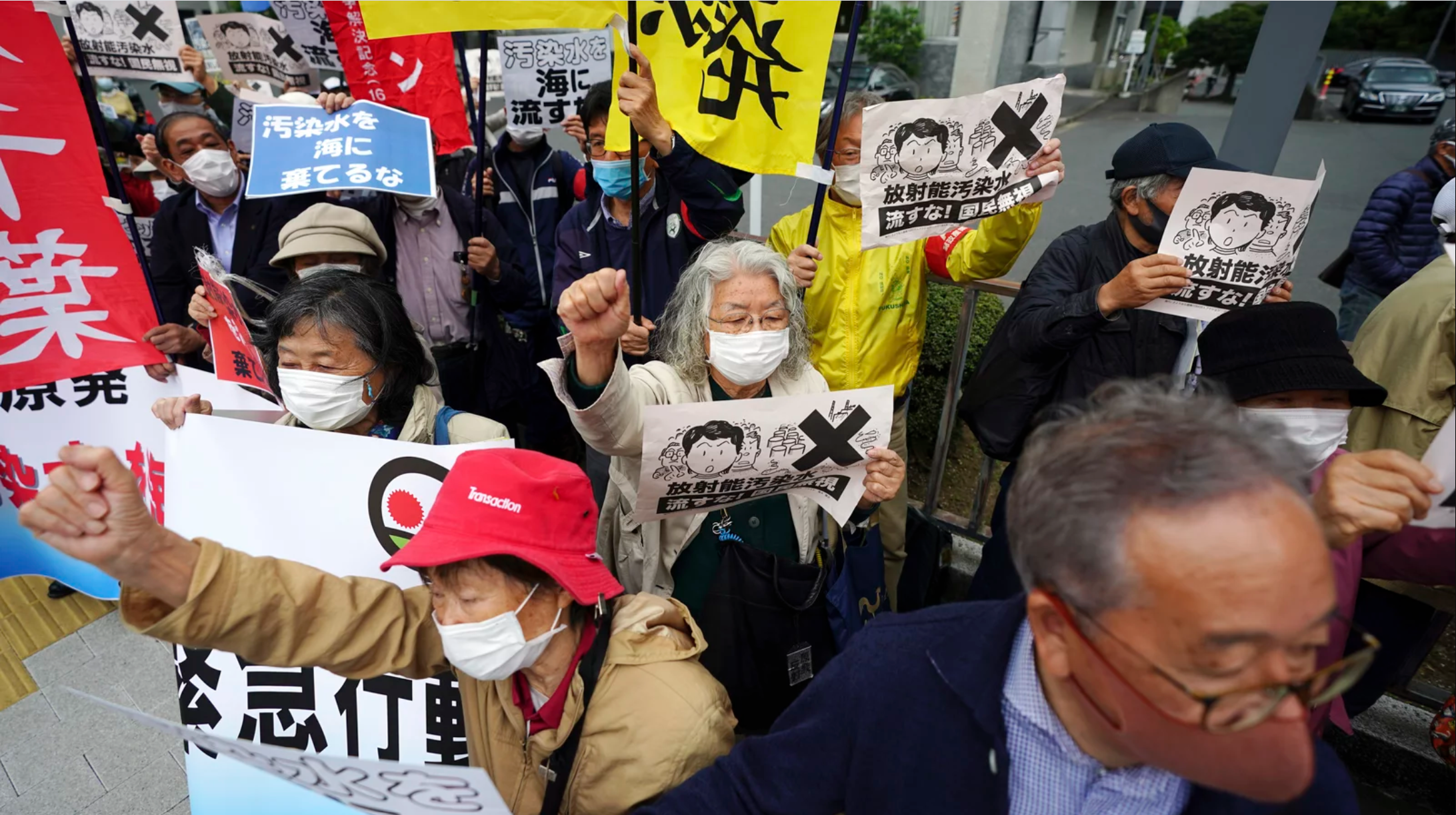People in Tokyo protest a decision to start releasing into the ocean massive amounts of treated wastewater from the Fukushima nuclear plant. The plant was damaged in a 2011 earthquake and tsunami. Eugene Hoshiko/AP