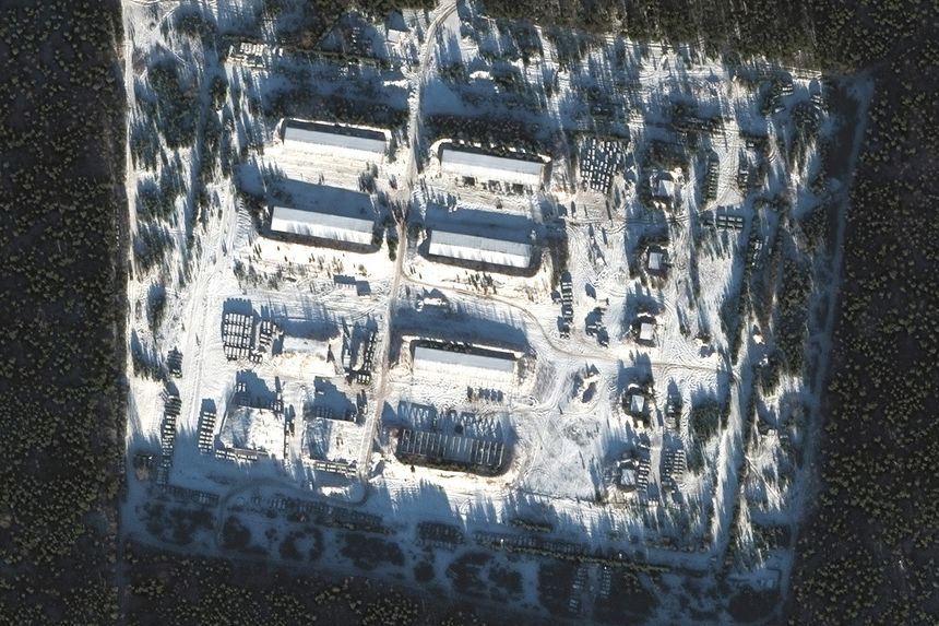An overview of an abandoned ammunition storage facility near Klintsy, Russia, close to both the Ukraine and Belarus borders, on Dec. 25. Images have revealed more than 350 vehicles parked there. PHOTO: MAXAR