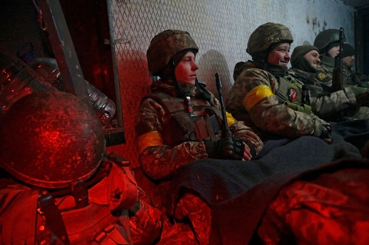 Ukrainian servicemen defended a military airbase Sunday in Vasylkiv, south of Kyiv. MAKSIM LEVIN/REUTERS