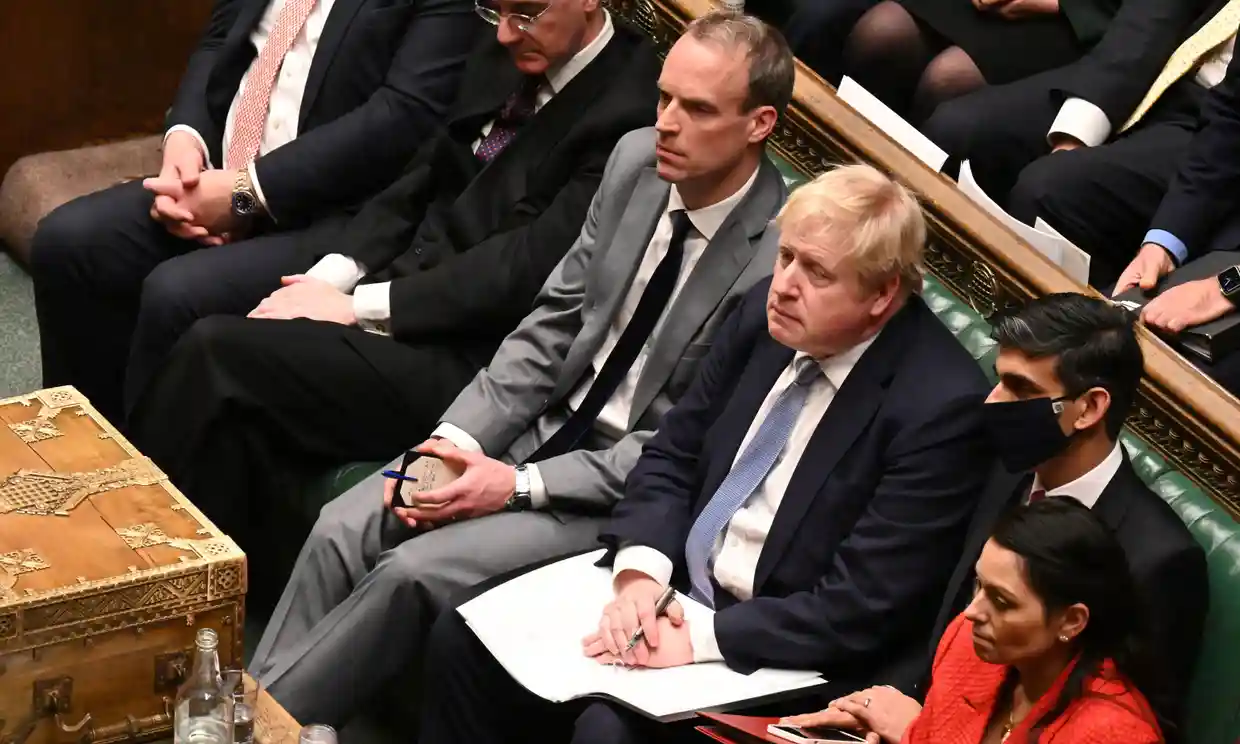 Dominic Raab, justice secretary (left) with the prime minister in the Commons on Monday. Photograph: UK Parliament/Jessica Taylor/PA