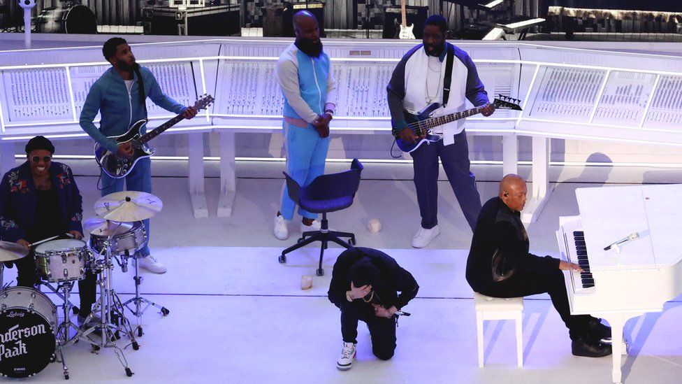 GETTY IMAGES | Eminem was seen taking the knee at the end of his performance