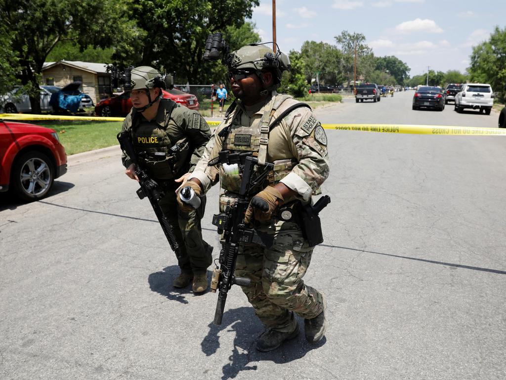 Law enforcement personnel near the scene of the shooting at Robb Elementary School. Picture: Marco Bello/Reuters