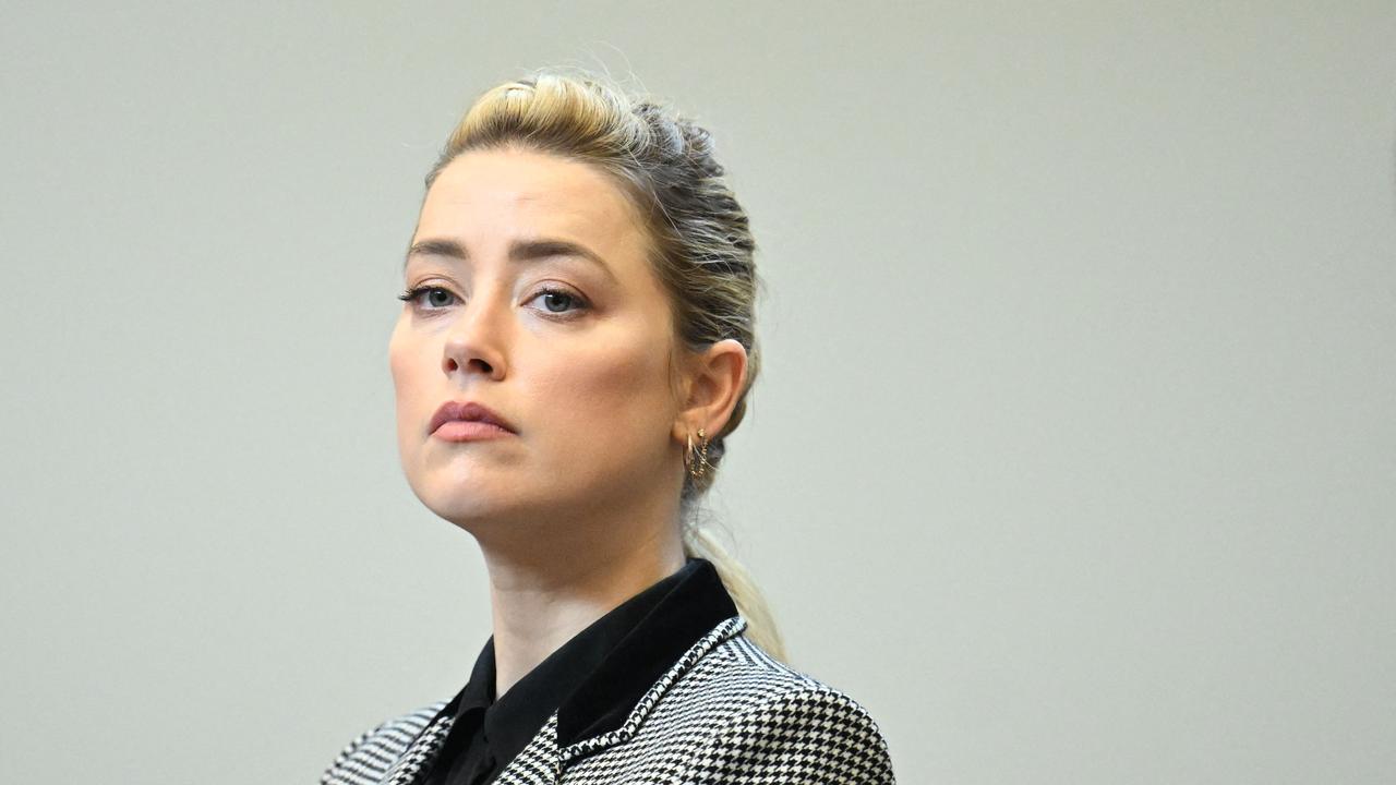 US actress Amber Heard looks on in the courtroom at the Fairfax County Circuit Courthouse. (Photo by JIM WATSON / POOL / AFP)