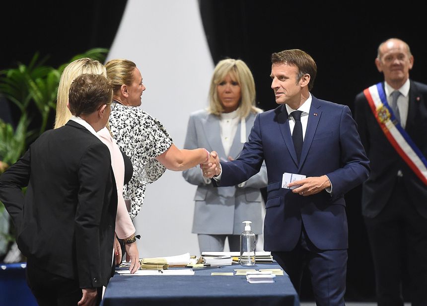 French President Emmanuel Macron, arriving Sunday to vote in Le Touquet, appears to have lost parliamentary seats to far-right and far-left parties. PHOTO: SEBASTIEN JARRY/ZUMA PRESS