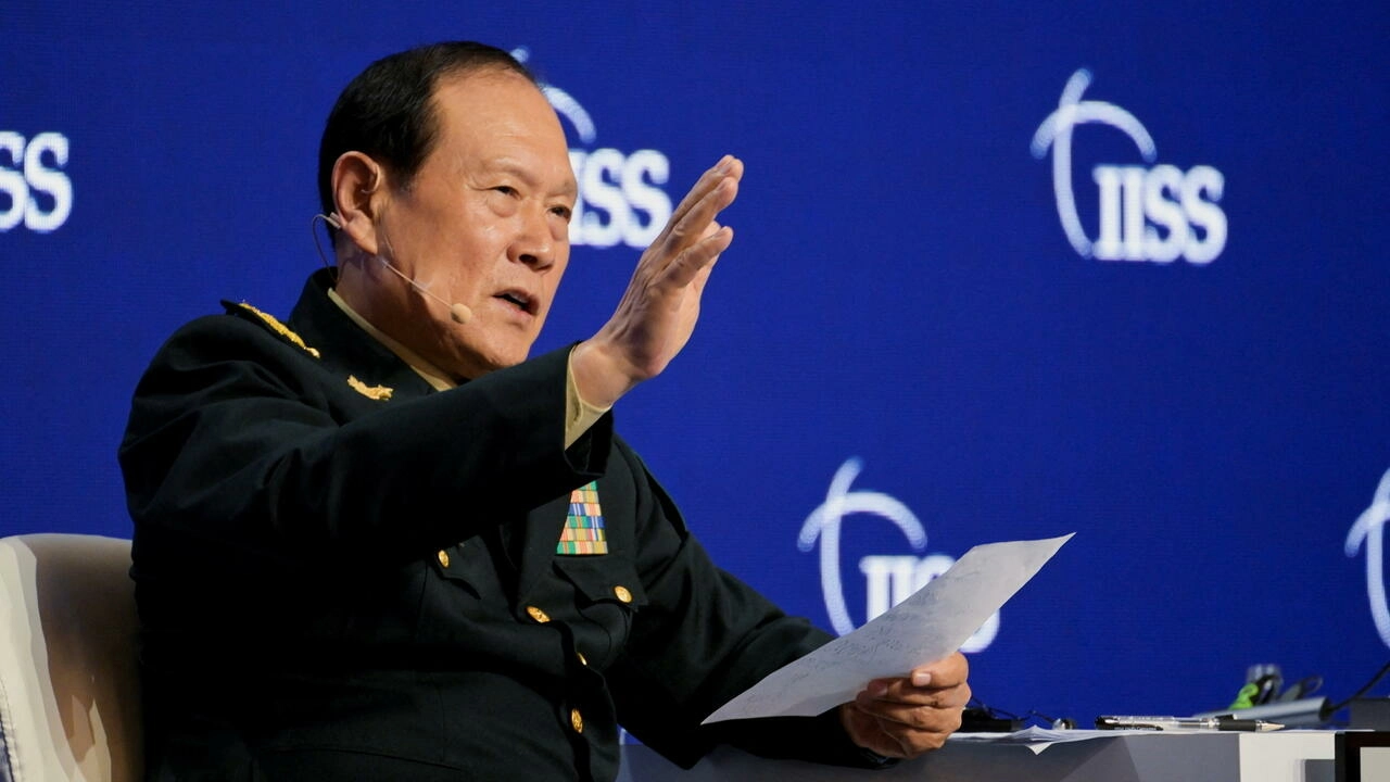 China's State Councilor and Defence Minister General Wei Fenghe answers questions from the audience at a plenary session during the 19th Shangri-La Dialogue in Singapore on June 12, 2022. © Caroline Chia; Reuters