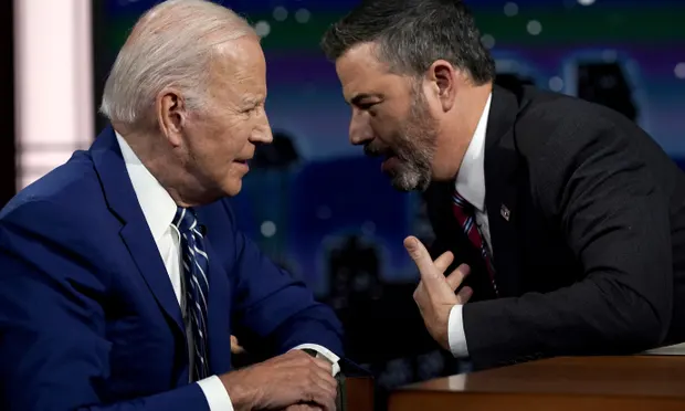 Joe Biden and Jimmy Kimmel. ‘Can’t you issue an executive order? Trump passed those out like Halloween candy.’ Photograph: Evan Vucci/AP