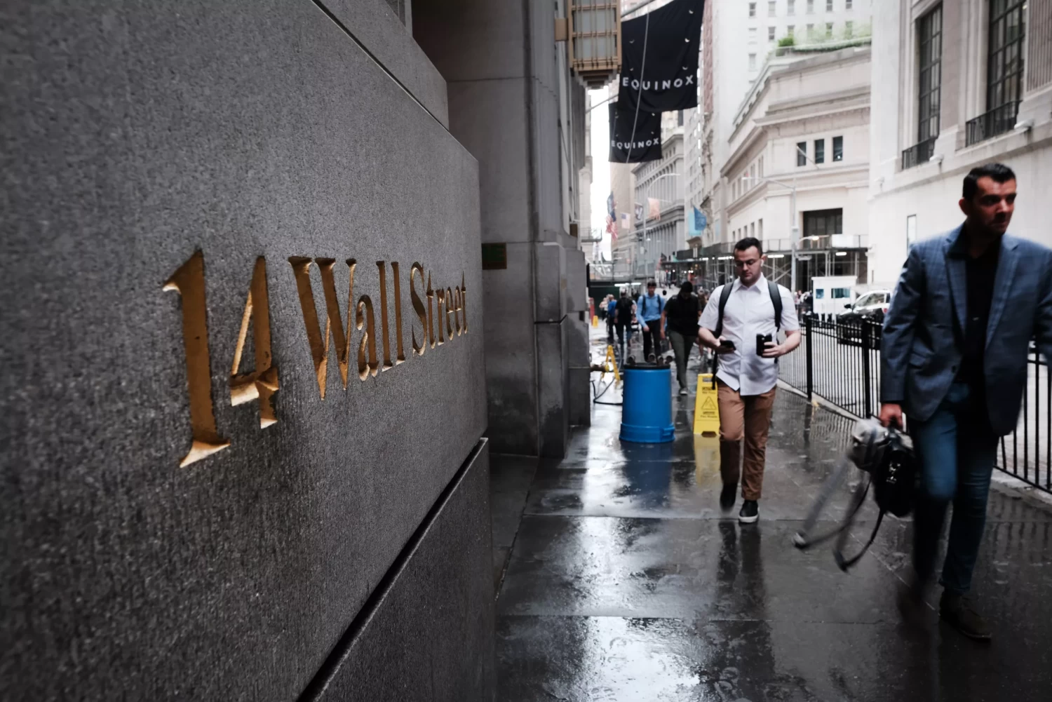 The share of Americans who believe the U.S. is in a recession crossed the 50 percent mark this month. People walk by the New York Stock Exchange (NYSE) on June 14, 2022 in New York City SPENCER PLATT/GETTY