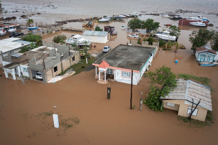 Homes were flooded on Salinas Beach after the passing of Hurricane Fiona in Salinas, Puerto Rico. PHOTO: ALEJANDRO GRANADILLO/ASSOCIATED PRESS