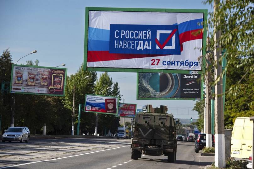 FILE - Billboard reads: "With Russia forever, September 27", before referendum in Luhansk People's Republic, controlled by Russia-backed separatists, 22 September 2022AP/Copyright 2022 The Associated Press. All rights reserved