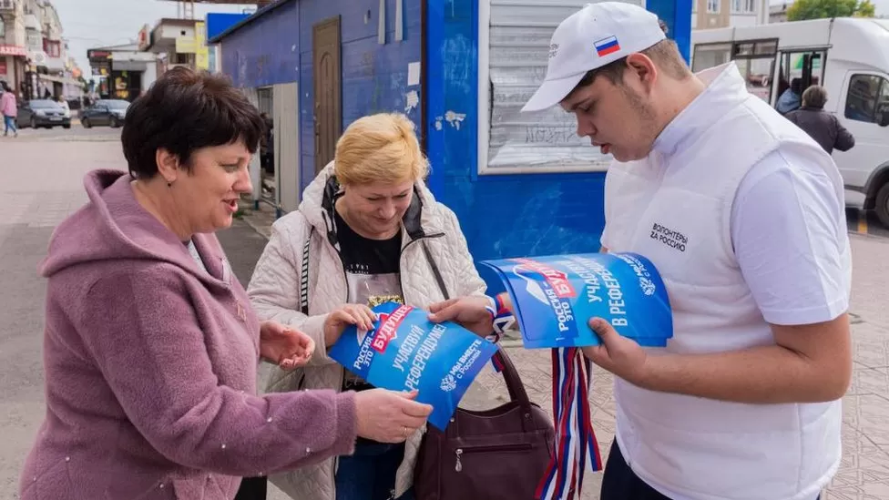EPA-EFE/REX / Booklets were handed out on the eve of the referendum in Luhansk