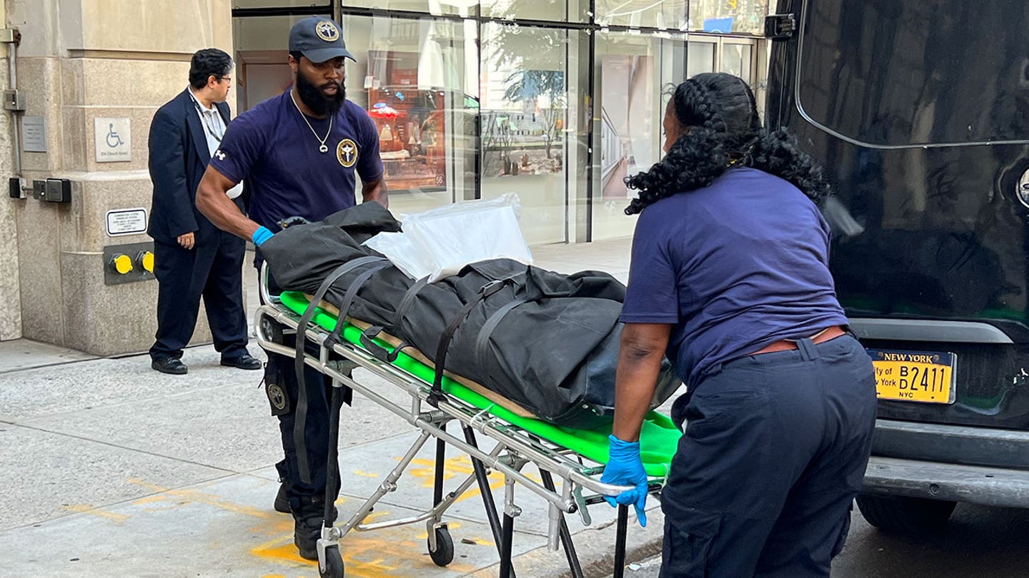 First responders move the body of Gustav Arnal. (Credit: Peter Gerber for Fox News Digital / | This article was produced in partnership with FOX Bet |)