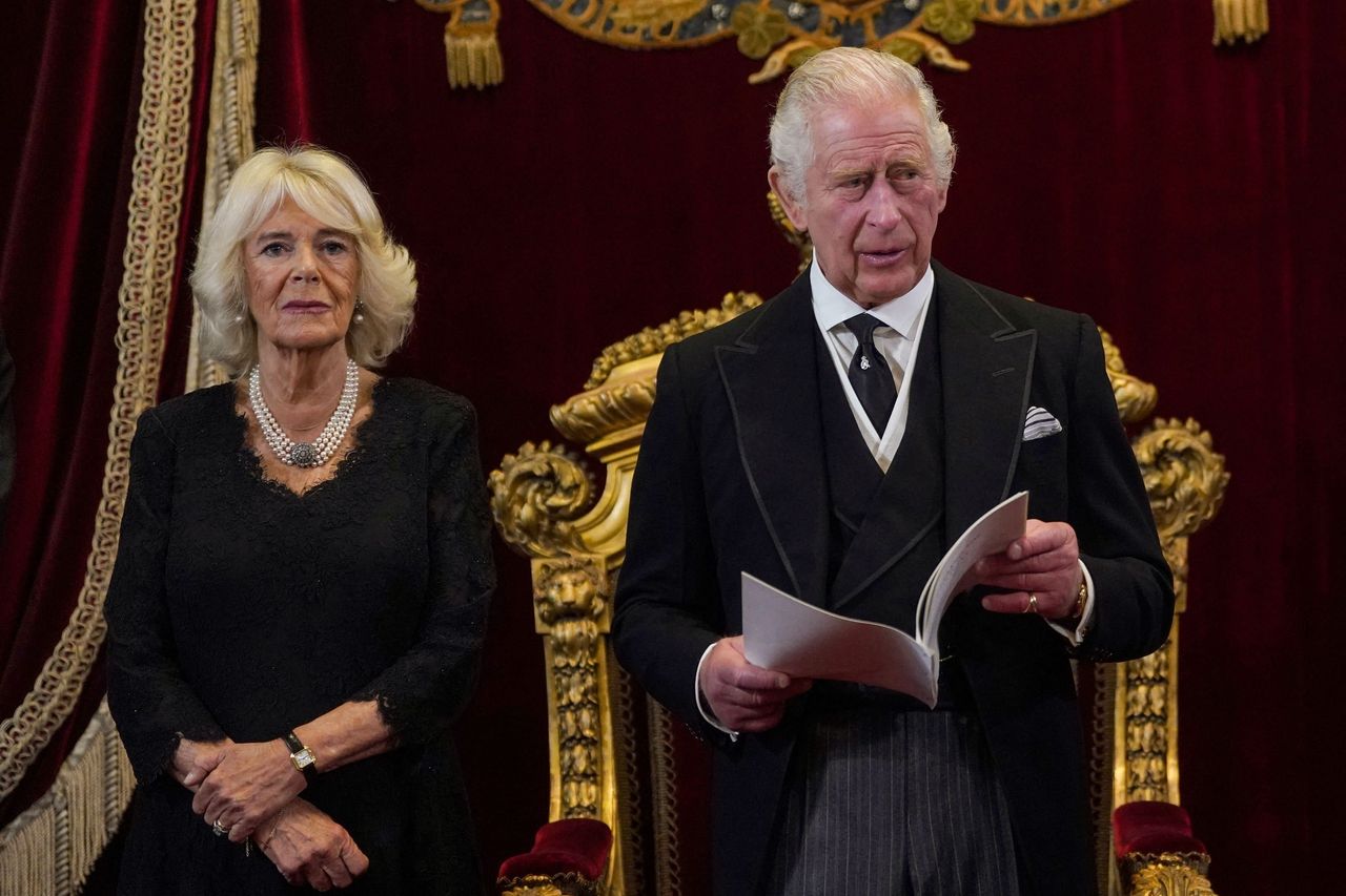 Britain’s Camilla, queen consort, with King Charles III during a ceremony at St. James’s Palace in London Saturday. VICTORIA JONES/POOL/AFP VIA GETTY IMAGES