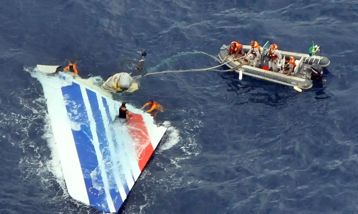 Divers recover part of the tail section from the Air France A330. Photograph: BRAZILIAN NAVY/AFP/Getty Images
