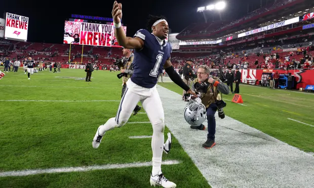Cowboys maul Brady’s listless Bucs for first road playoff win in 30 years