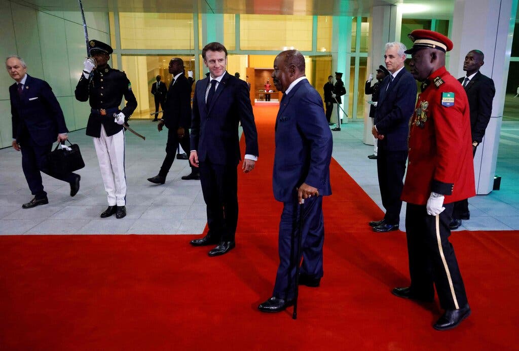 President Emmanuel Macron of France and President Ali Bongo Ondimba of Gabon at the Presidential Palace in Libreville on Wednesday.Credit...Ludovic Marin/Agence France-Presse — Getty Images